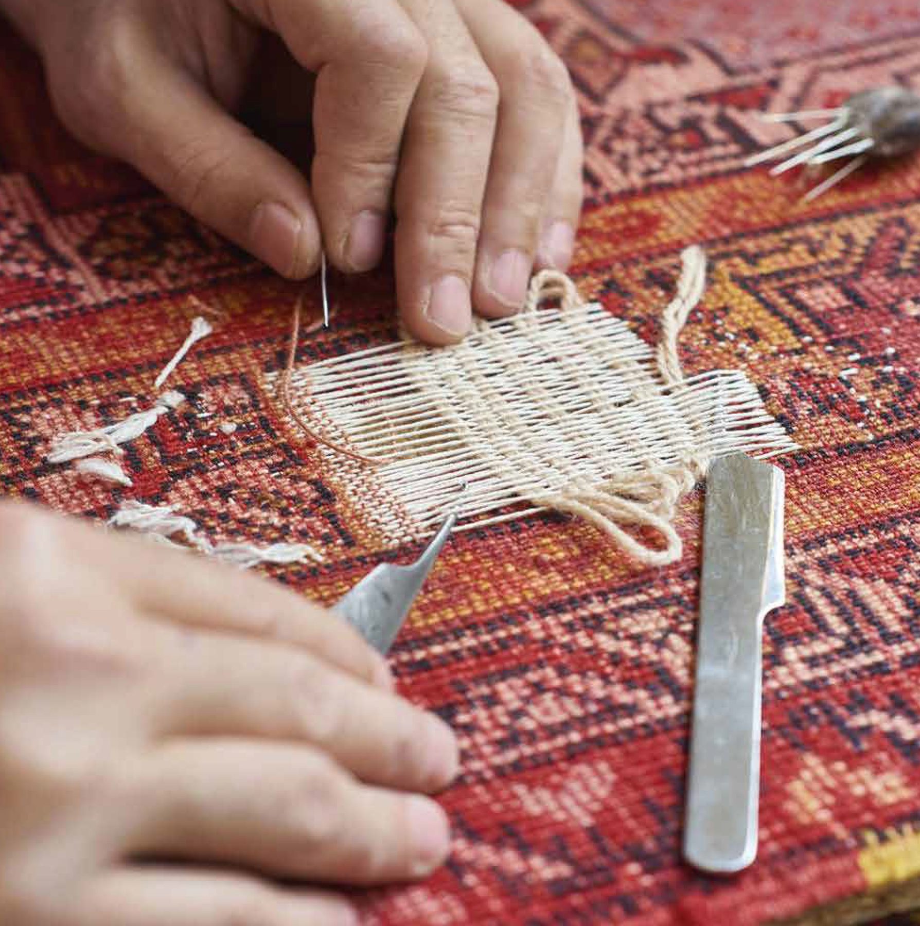 Trou de tapis en cours de retissage